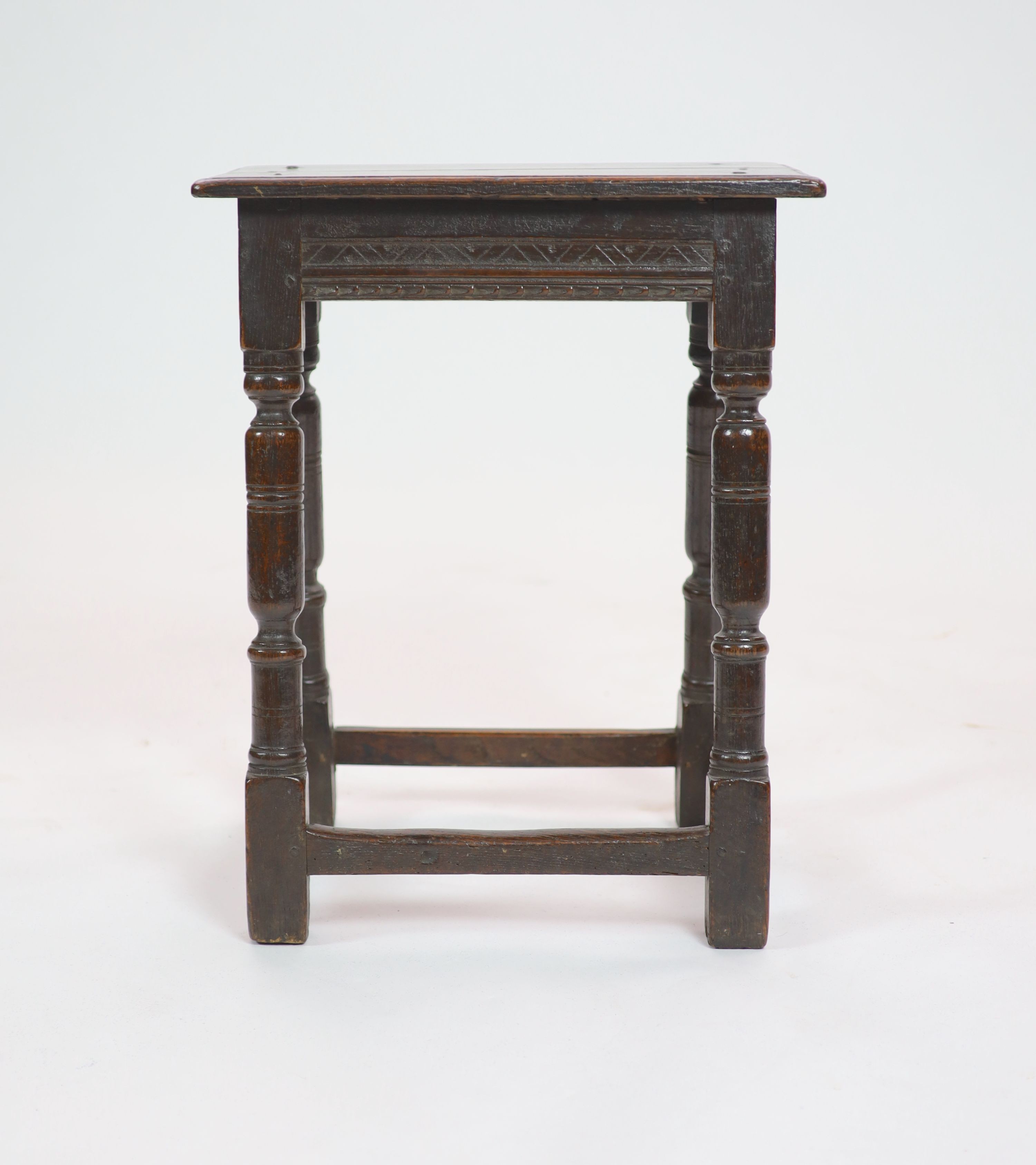 A mid-17th century oak joint stool H 58cm. W 47cm. D 28cm.